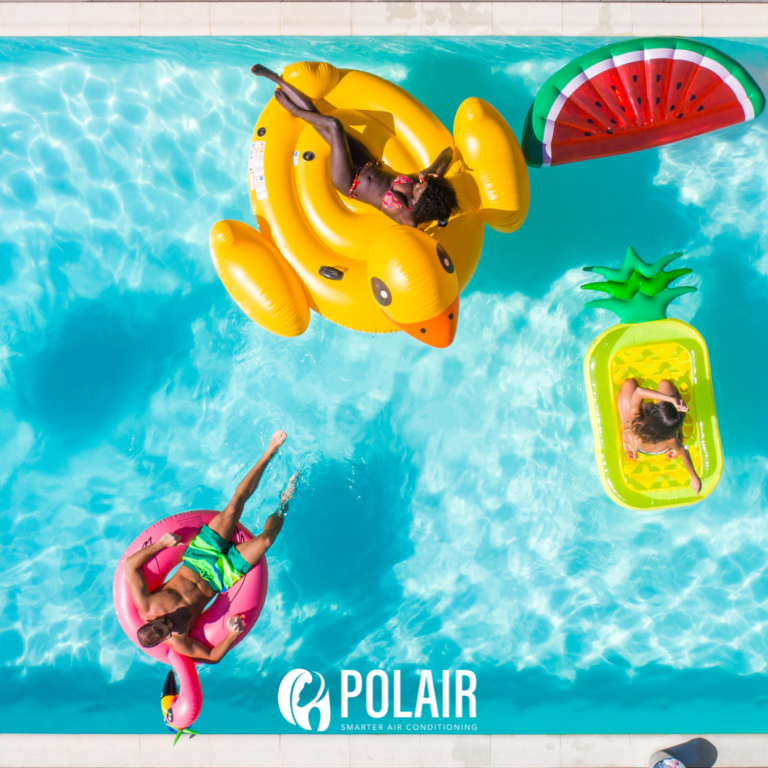Friends enjoying a pool with POLAIR Smart Pool Heater and Chillers